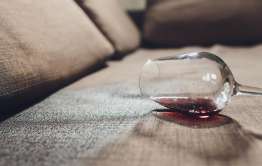 red wine spilled on sofa